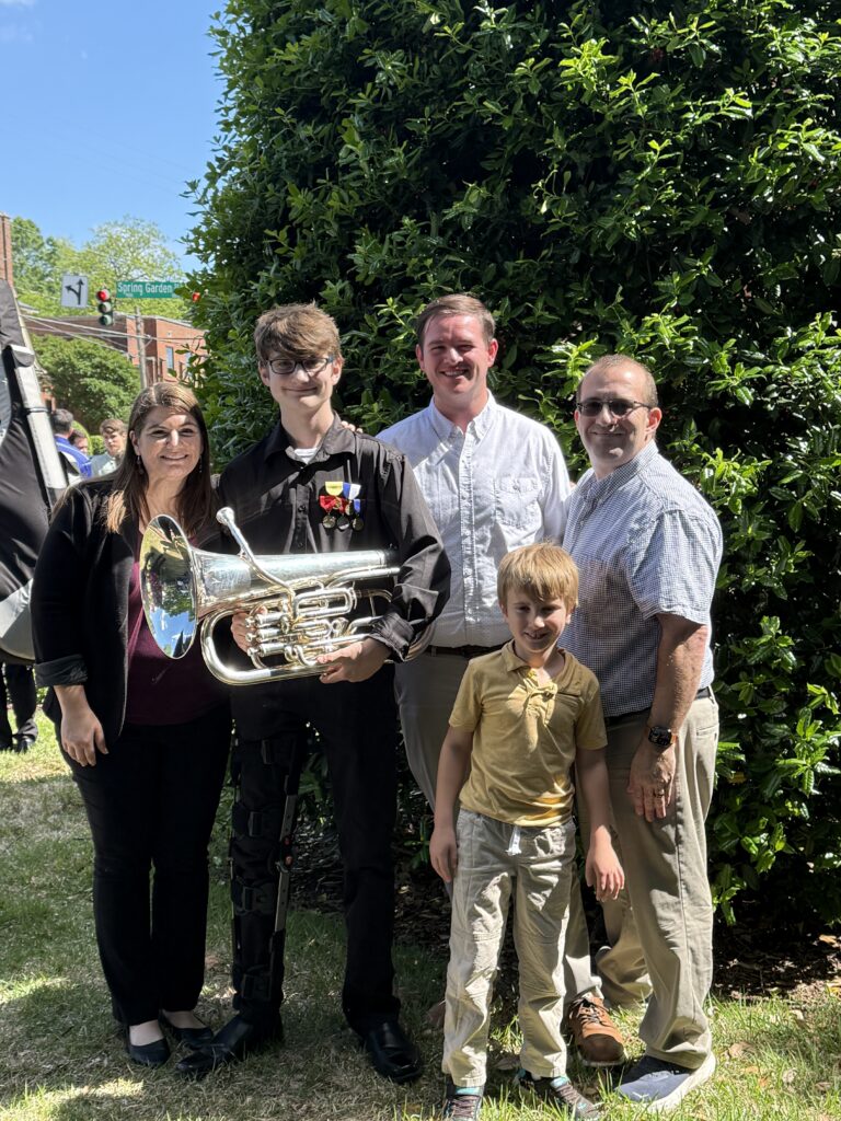 Aiden Beddingfield, 2025 NC All State First Chair Euphonium, pictured here with his mother and Hawfields MS Director of Bands, Mrs. Jennifer Payne; Director of Bands, Mr. Dylan Hatley; little brother, Aaron Payne; and dad, band booster president and brass instructor, Mr. Ron Payne.